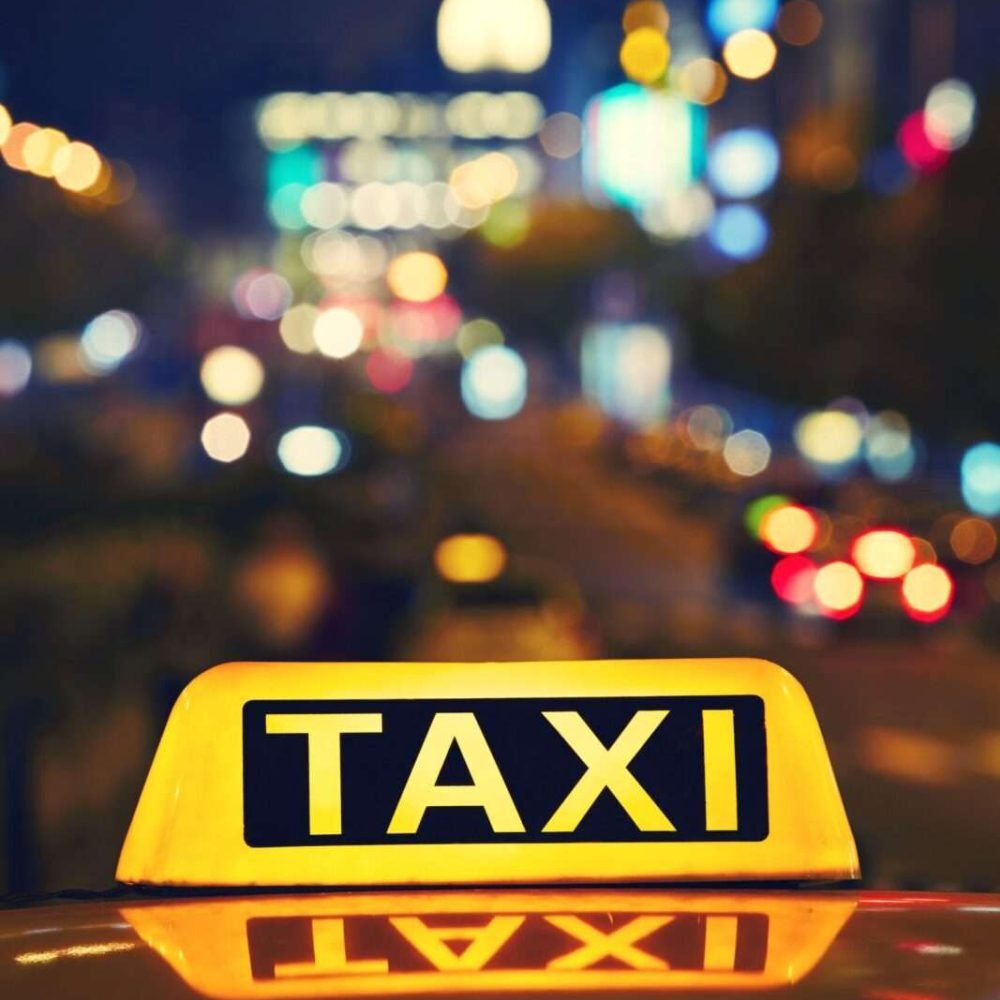 Taxi car on the street at night - Wenceslas Square, Prague