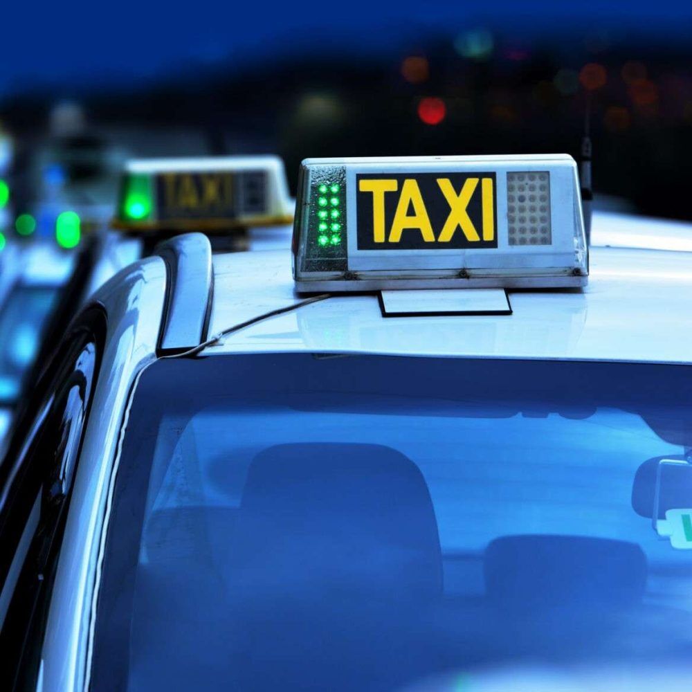 Keywords: avenue;bokeh;business;car;city;city life;contemporary;customer;europe;foreground;letter;light;metropolitan;neon;night;occupation;outdoors;passengers;rain;reflection;road;roof;season;selective attention;service;sign;spain;street;symbol;taxi;taxi rank;taxi sign;traffic;transportation;travel;unfocused;vehicle;vehicles;waiting;yellow